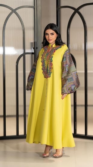 جلابية بلون اصفر مطرزة شك يدوي