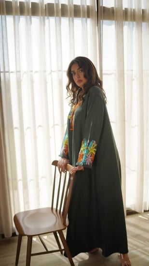 جلابية شتوية بلون زيتي