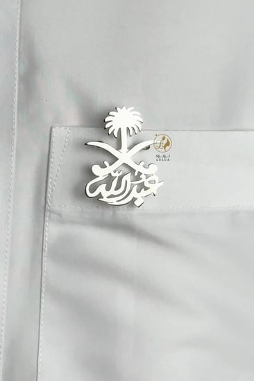 بروش بالاسم مع سيفين ونخلة