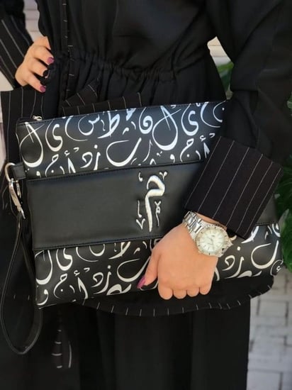شنط باوتش الحروف عربية