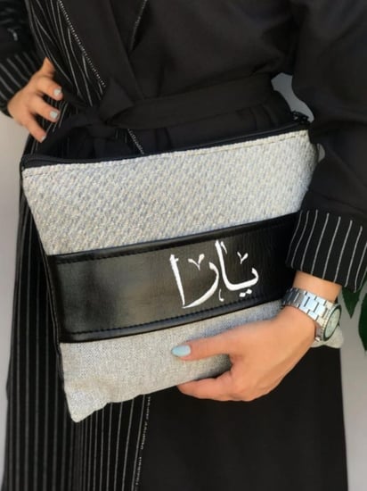 شنطة باوتش نوتيد قماش و حزام جلد متعددة الوان