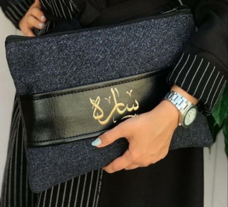 شنطة باوتش نوتيد قماش و حزام جلد متعددة الوان