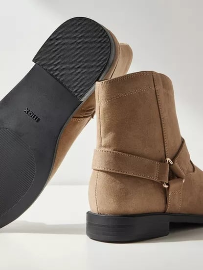 بوت سادة طول الكاحل بسحاب إغلاق