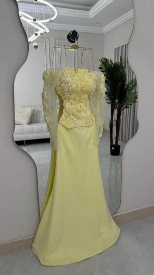 فستان سهرة اصفر ورد