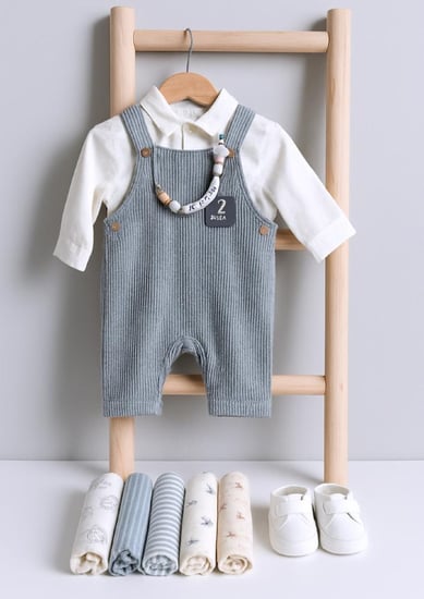 طقم  استقبال مواليد أنيق بدرجات رمادية هادئة – أناقة ناعمة لطفلك