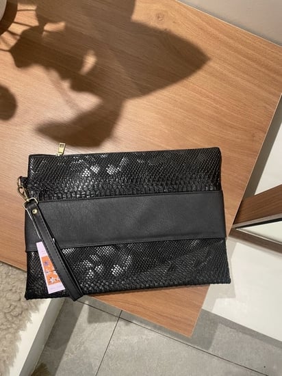 باوتش جلد اسود مع مسكه