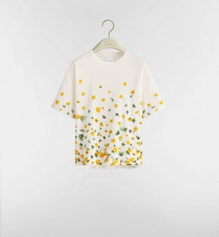 كنزة ديور باتر كاب بأكمام قصيرة لون أبيض بنقشة زهور صفراء