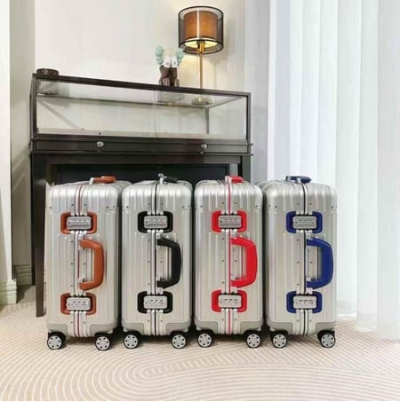 حقائب سفر RIMOWA Original Twist بلون فضي معدني