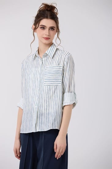 بلوزة كتان بتقليمات