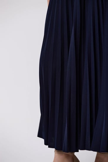 تنورة كلوش مكسر كحلي