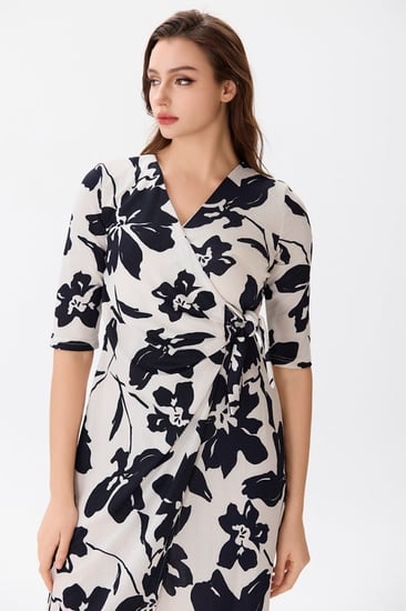 فستان قطن اوف وايت بنقشة الورد الأسود