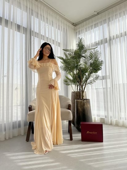 فستان طويل رفلز باكمام طويله