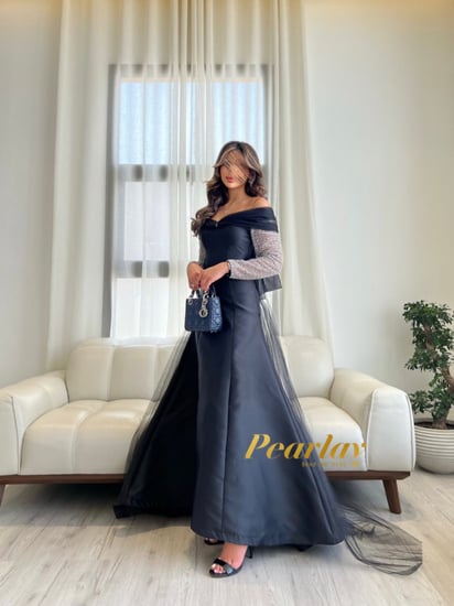 فستان سهره اسود باكمام شفافه فضي