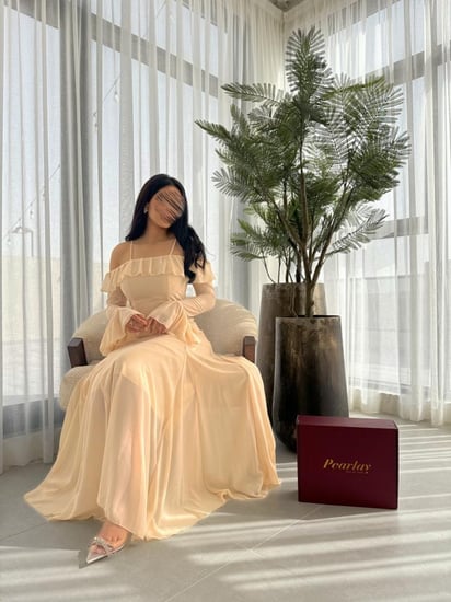 فستان طويل رفلز باكمام طويله