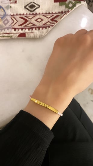 اسواره ذهبيه بخيط ملون حبه واحده