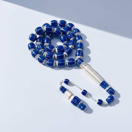 سبحة عاج ناب الفيل طبيعي مع كسر حجر اللازورد و الفضة