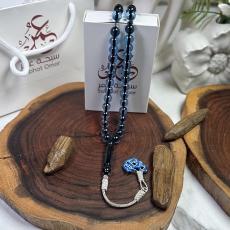 مسباح بكلايت أزرق شفاف طربزونة