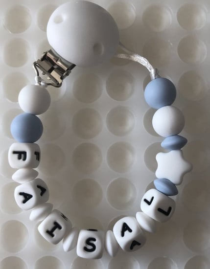 تعليقه مصاصه سلكون بالاسم