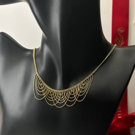 طقم ذهب عيار21 بوزن 20.71 جم تقريبا