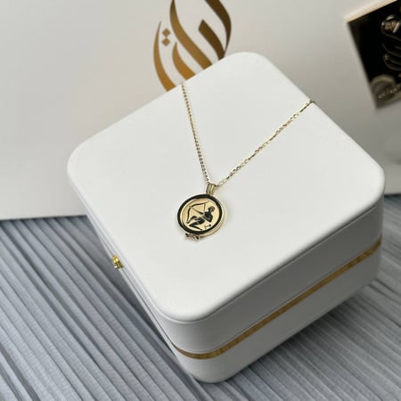 عقد برج القوس ذهب عيار18 بوزن 3.86 جم تقريبا
