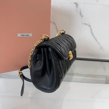 حقيبة ميو ميو