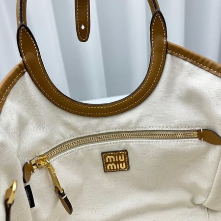 حقيبة ميو ميو