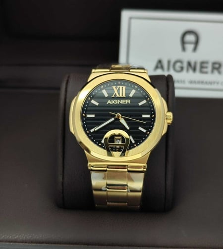 ساعات اقنر رجالي ذهبي