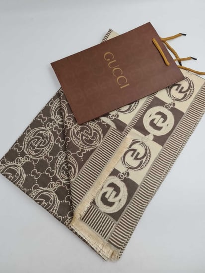 وشاح قوتشي نسائي