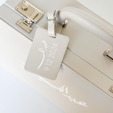 حقيبة جلدية فاخرة بلباس من TED BAKER