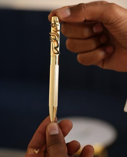 قلم ذهبي
