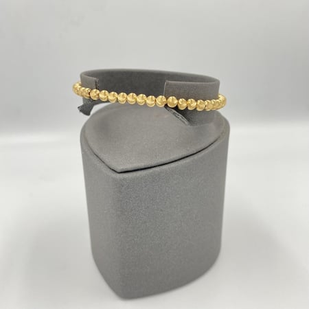 اسوارة ذهب صافي عيار 18 تصميم كرات جميله وبراقه الوزن 3.01 جرام