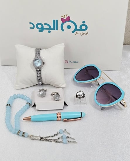 طقم أطفال مميز بلون الفيروزي الأنيق