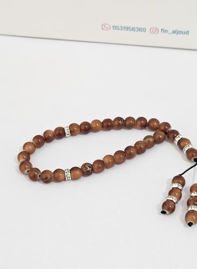 سبحة أطفال بني دافئ بخَرَز دائري لامع