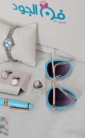 طقم أطفال مميز بلون الفيروزي الأنيق