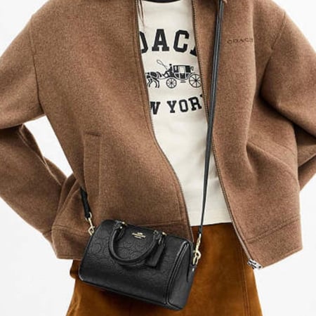 شنطة كوتش ميني روان اسود لوقو محفور