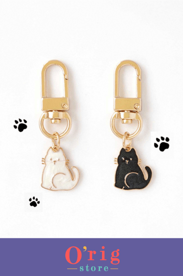 سلاسل مفاتيح بتصميم  قطط (أبيض و أسود)