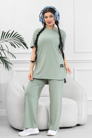 ترنج نسائي كاجوال ريب سادة تيشرت قصير من الأمام وظهر طويل بياقة دائرية وبنطال مزود بجيب جانبية