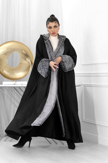 فروة شتوية مبطنة مع فرو على الأطراف