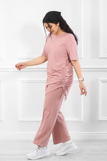 ترنج نسائي كاجوال ريب سادة تيشرت طويل مزموم على الطرفين وياقة مدورة