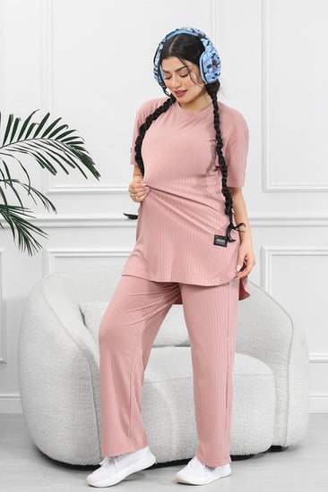 ترنج نسائي كاجوال ريب سادة تيشرت قصير من الأمام وظهر طويل بياقة دائرية وبنطال مزود بجيب جانبية