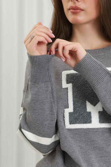 ترنج شتوي كاجوال مخطط بأكمام طويلة وجيب