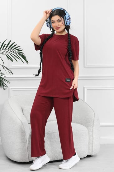 ترنج نسائي كاجوال ريب سادة تيشرت قصير من الأمام وظهر طويل بياقة دائرية وبنطال مزود بجيب جانبية