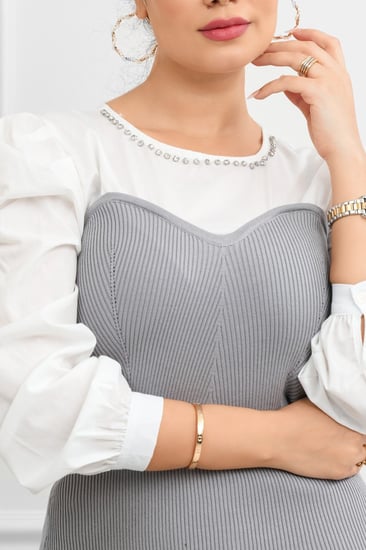 بلوزة نسائية أنيقة بأكمام منتفخة