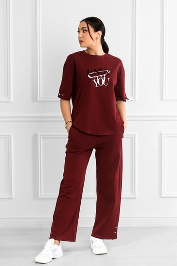 ترنج نسائي كاجوال بتيشرت قصير من الأمام مع أزرار معدنية تزين الأكمام والبنطال