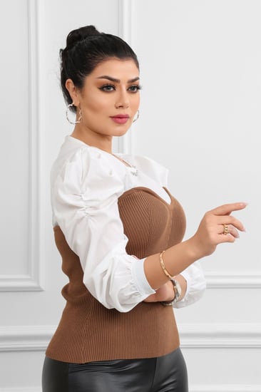 بلوزة نسائية أنيقة بأكمام منتفخة