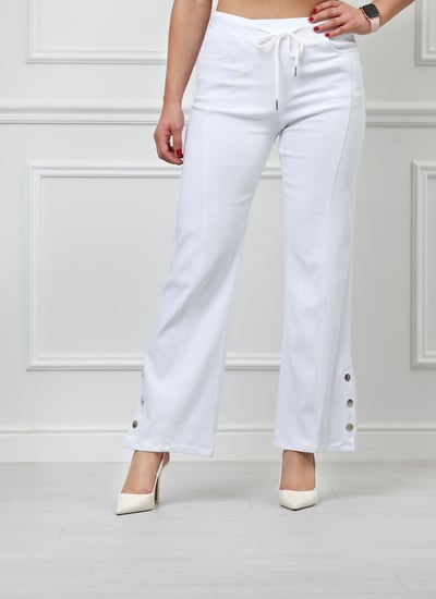 بنطال جينز خصر متوسط برباط مطاطي بقصة واسعة حتى الكاحل مع ازرار