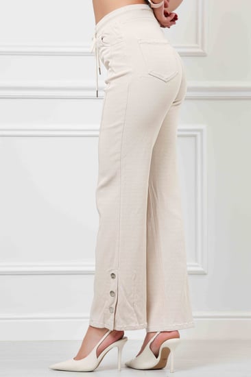 بنطال جينز خصر متوسط برباط مطاطي بقصة واسعة حتى الكاحل مع ازرار