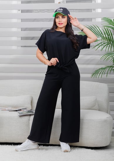 طقم نسائي كاجوال سادة توب نص كم مزين بربطة أمامية وبنطال واسع