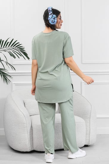 ترنج نسائي كاجوال ريب سادة تيشرت قصير من الأمام وظهر طويل بياقة دائرية وبنطال مزود بجيب جانبية