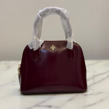 شنطة توري بورش جلد براءات الاختراع عنابي صغيره